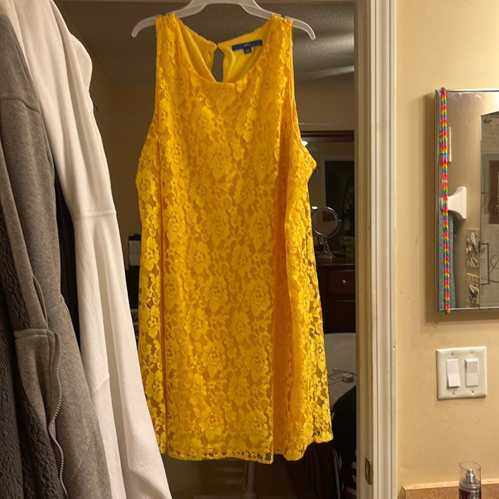 An Apt.9 teen dress. It is a yellow with lovely lace. It a size XXL in juniors.